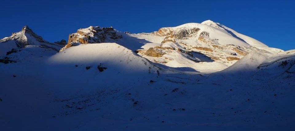 Tharong Peak ( Thorong Ri ) above Tharong La on crossing Tharong La high pass on Annapurna circuit trek in the Nepal Himalaya