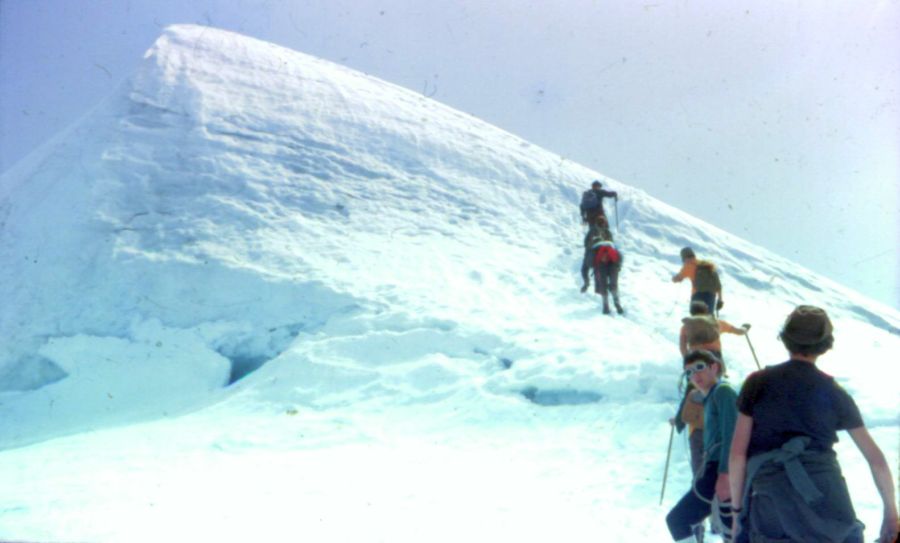 Ascending summit cone of Balmhorn in the Bernese Oberlands of Switzerland