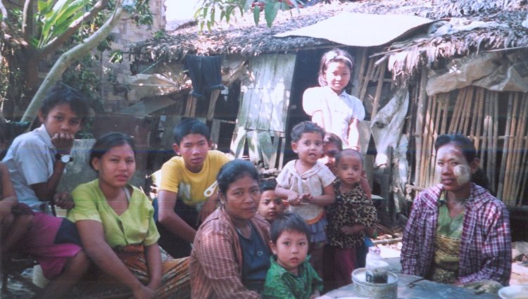 Chicha ( private guide ) and family in home town of Dalah on Yangon River in Yangon ( Rangoon ) in Myanmar ( Burma )