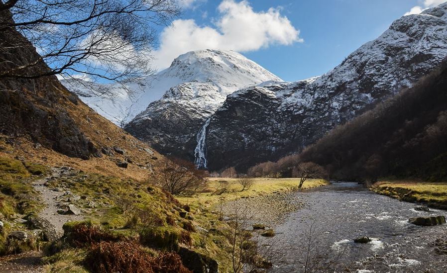 Steall waterfall in Glen Nevis beneath An Gearanach in the Mamores above Glen Nevis