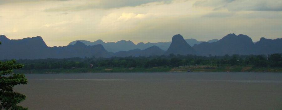 Laos hills across Maekong River from Nakhon Phanom in NE Thailand